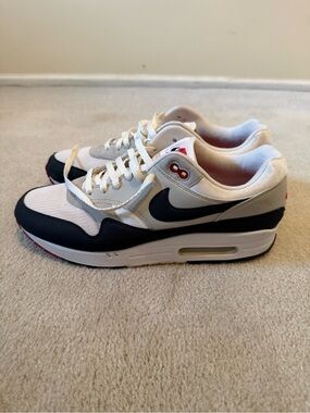 Nike Men’s Sneakers in White, navy and red accent